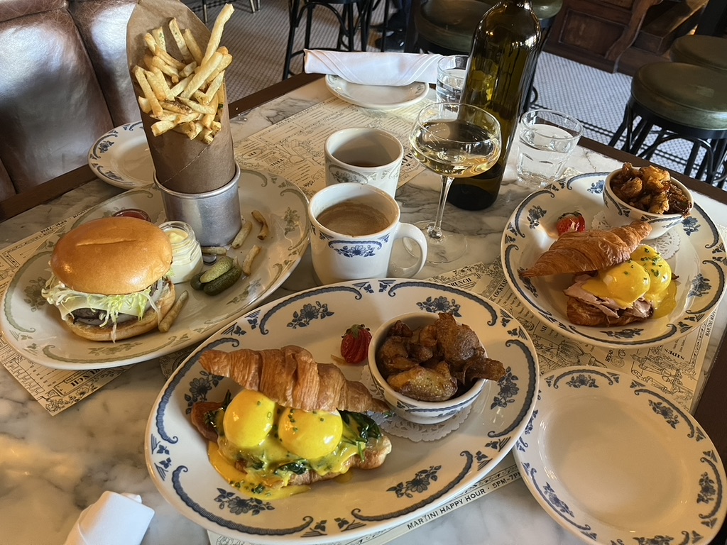 Brunch spread with sandwiches and coffee